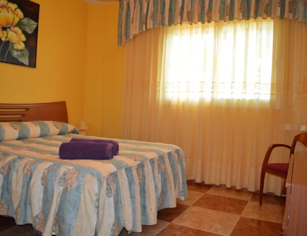 Dormitorio cama doble II