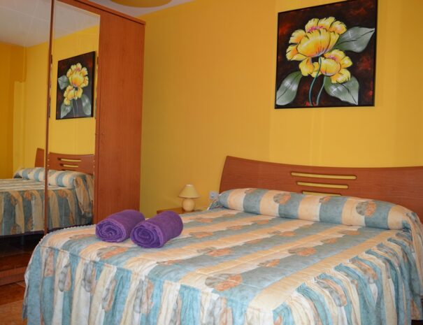 Dormitorio cama doble II
